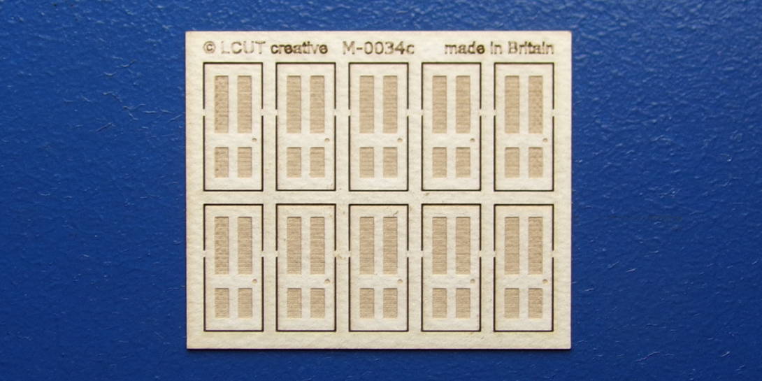 M 00-34c OO gauge kit of 10 single doors type 1 Kit of 10 single doors type 1
